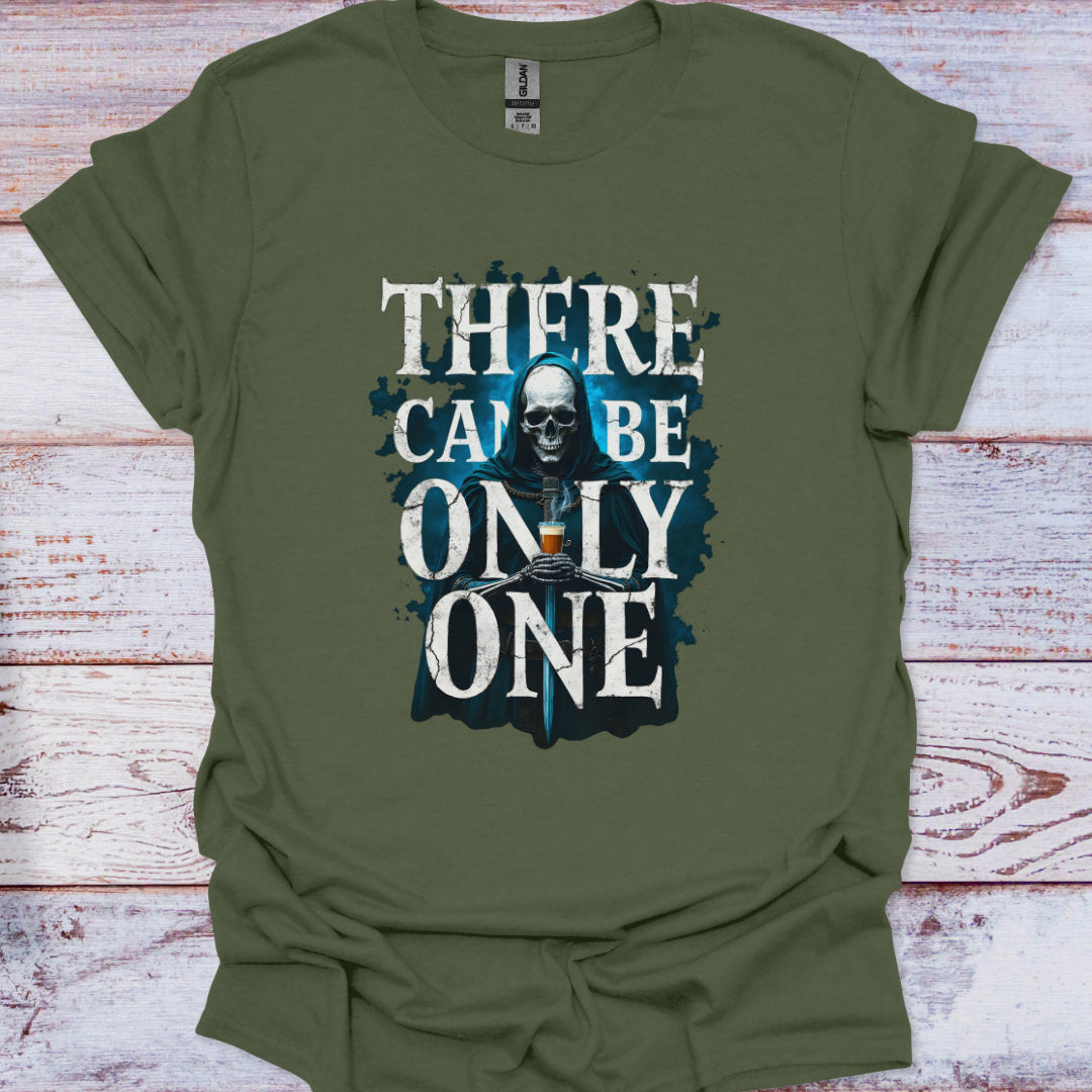 Green t-shirt with a skull graphic and text on a wooden surface