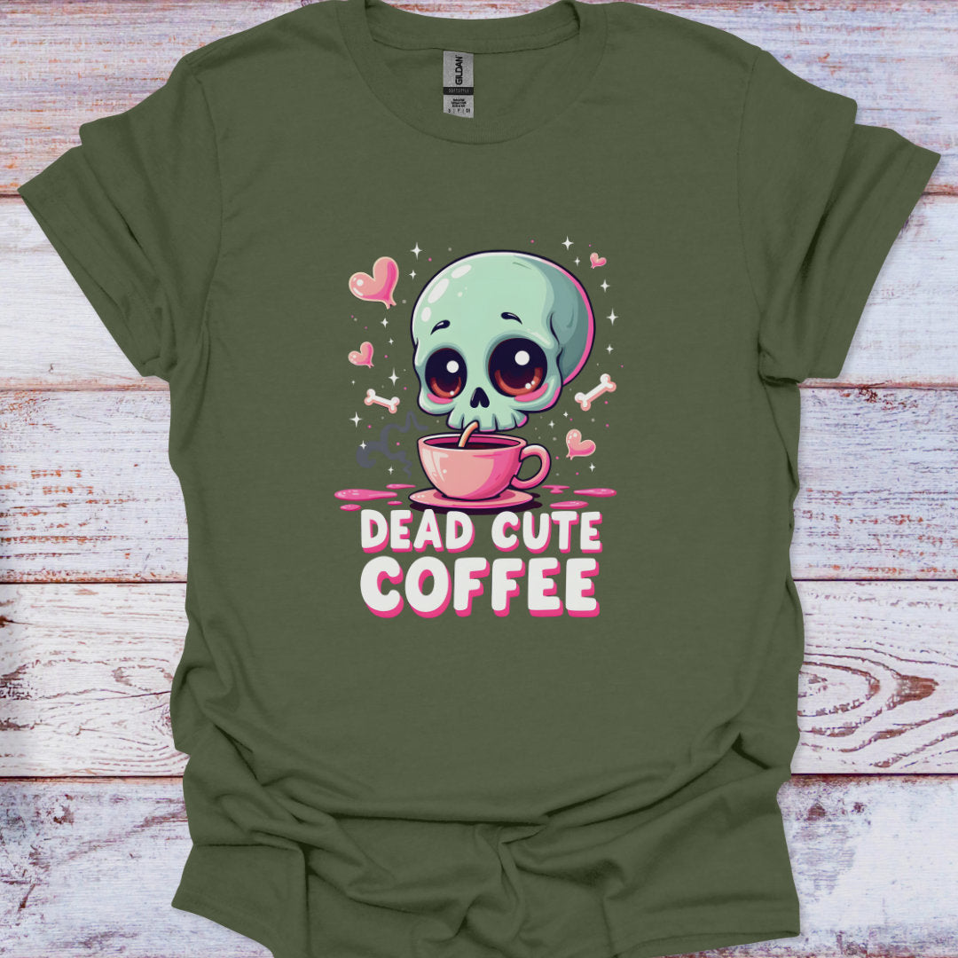 Green t-shirt with a skull holding a coffee cup and 'Dead Cute Coffee' text on a wooden surface