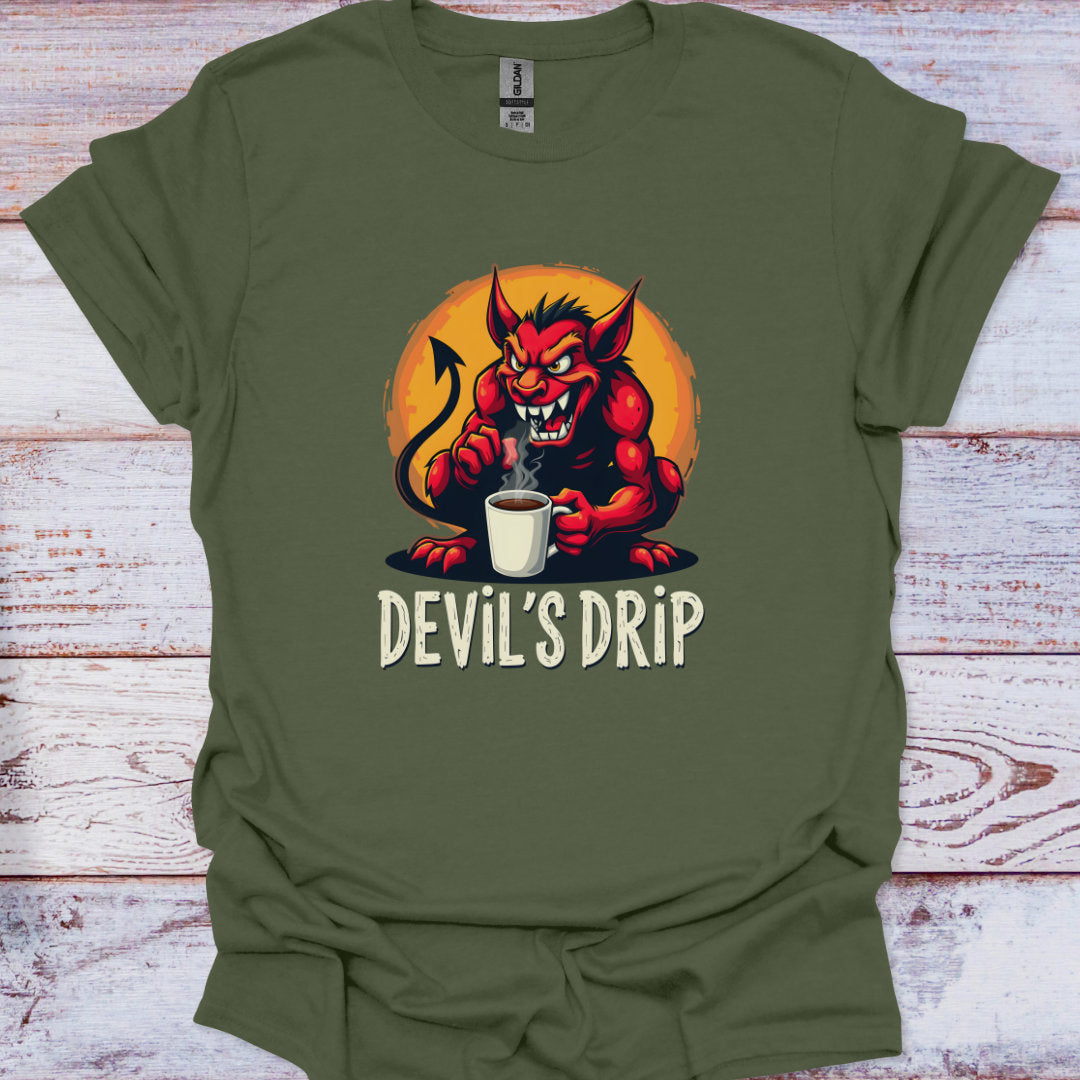 Green t-shirt with a cartoon devil holding a coffee cup and 'Devil's Drip' text on a wooden surface.