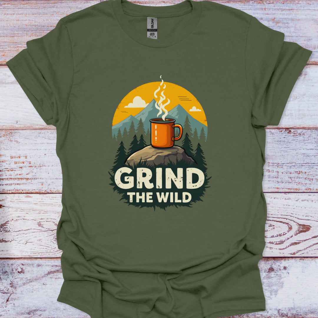 Green t-shirt with a graphic of a mug on a rock with trees and mountains, and 'Grind the Wild' text.