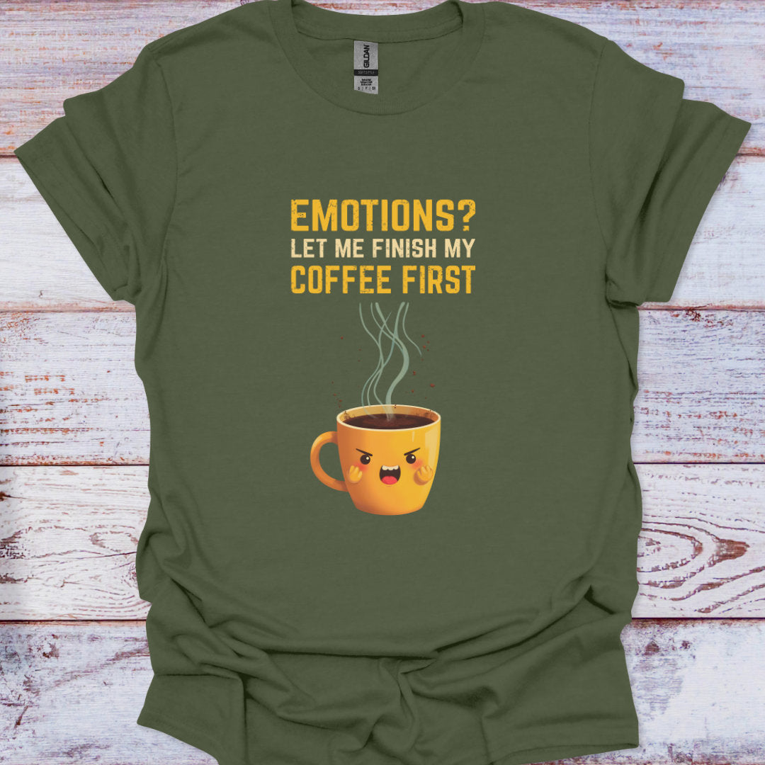 Green t-shirt with a coffee cup graphic and text on a wooden surface