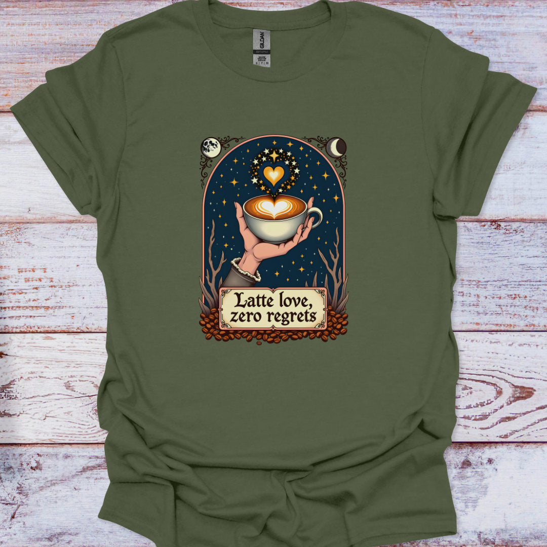 Green t-shirt with a graphic of a hand holding a coffee cup and text 'Latte love, zero regrets' on a wooden surface.