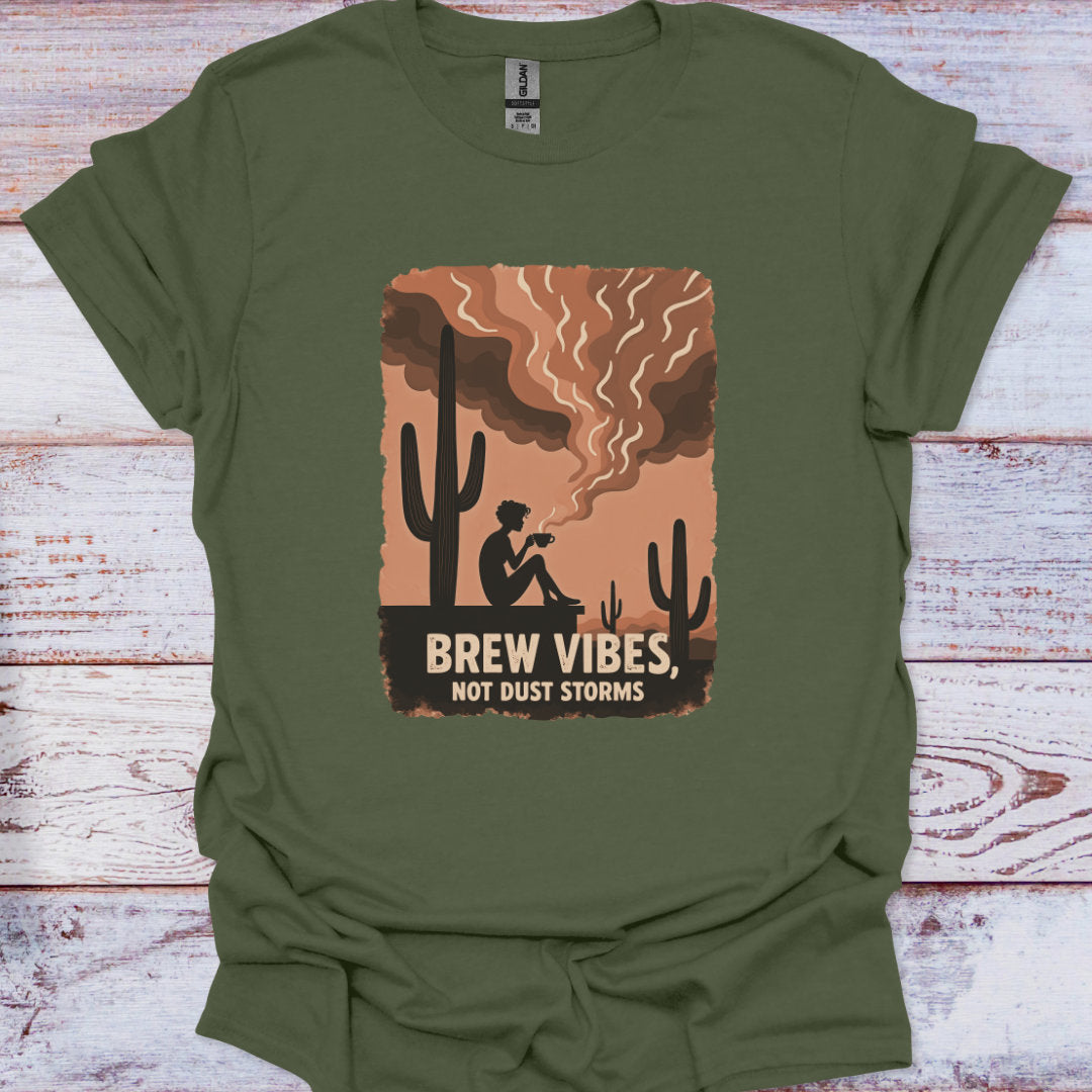 Green t-shirt with a graphic design featuring a cactus and text on a wooden surface