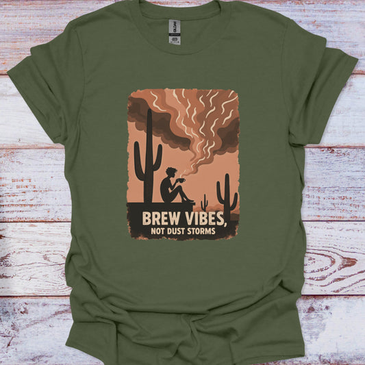 Green t-shirt with a graphic design featuring a cactus and text on a wooden surface