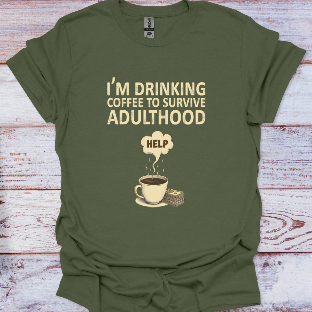 Green t-shirt with coffee-themed graphic and text on a wooden surface