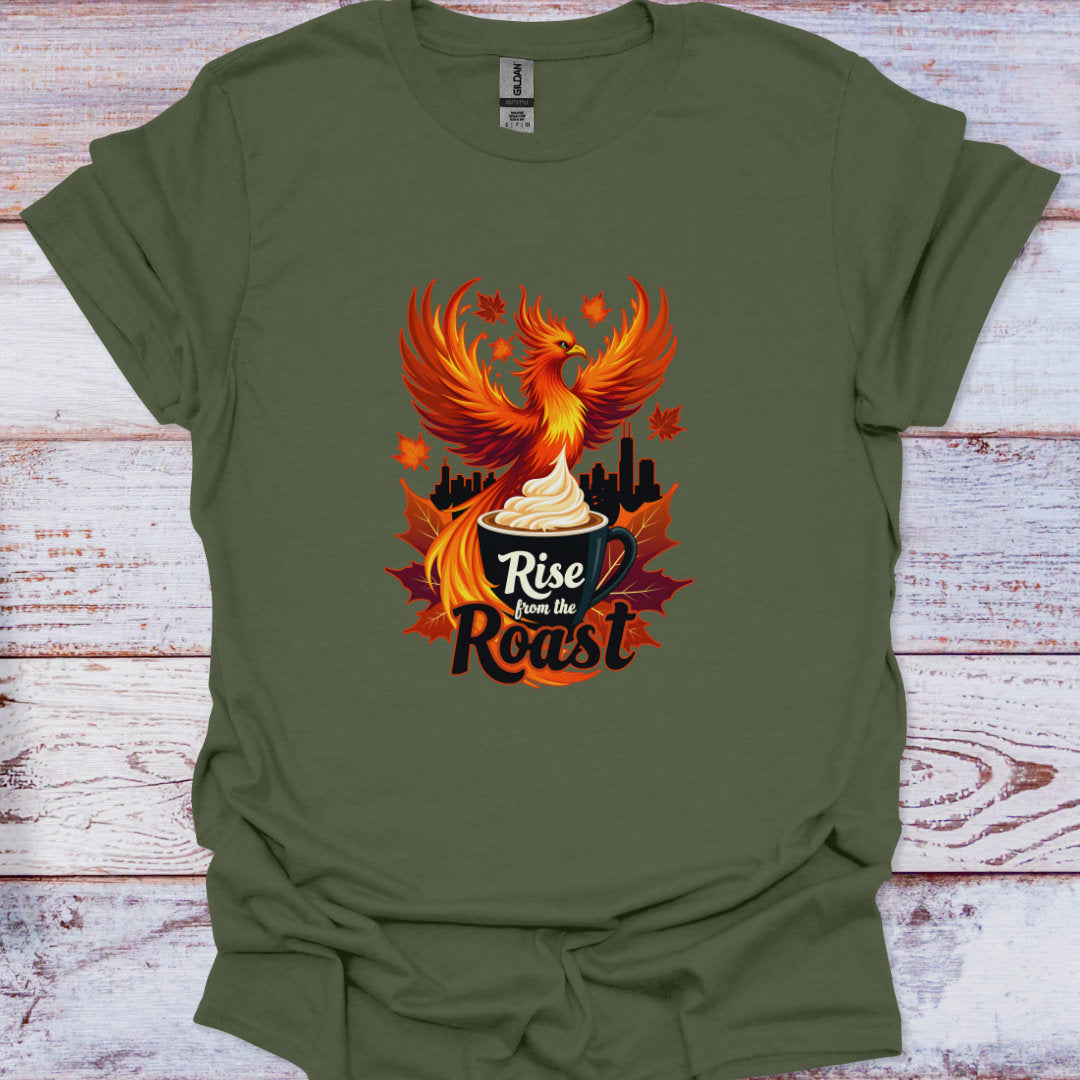Green t-shirt with a phoenix rising from a coffee cup graphic and 'Rise from the Roast' text on a wooden surface.