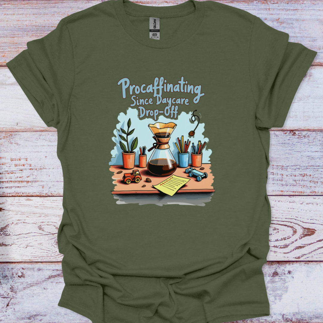Green t-shirt with a coffee-themed graphic and text on a wooden surface