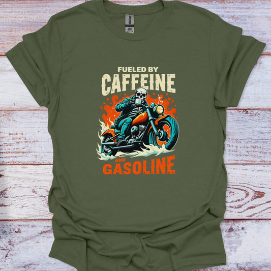 Green t-shirt with skeleton on a motorcycle graphic and text 'Fueled by Caffeine and Gasoline' on a wooden surface.