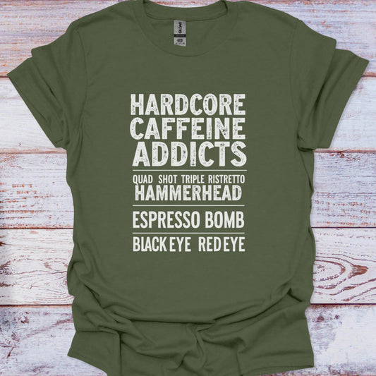 Green t-shirt with white text on a wooden surface