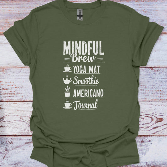 Green t-shirt with white text on a wooden surface
