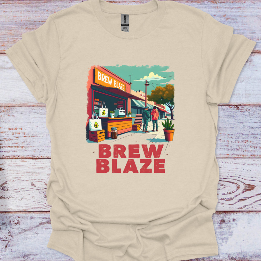 Beige t-shirt with 'Brew Blaze' graphic design on a wooden surface