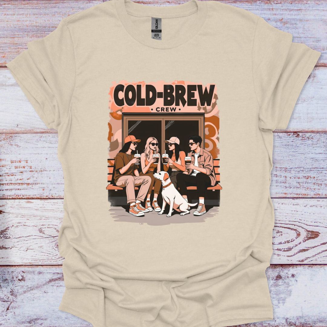 Beige t-shirt with 'Cold-Brew Crew' graphic on a wooden surface