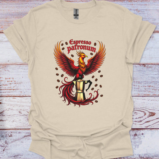Beige t-shirt with a phoenix and coffee cup design on a wooden surface