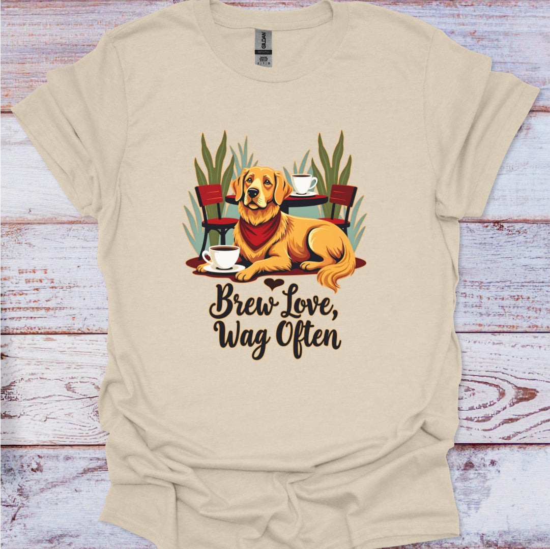 Beige t-shirt with a dog graphic and text 'Brew Love, Wag Often' on a wooden surface.