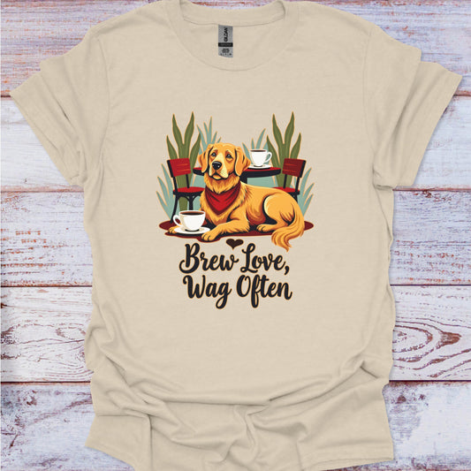 Beige t-shirt with a dog graphic and text 'Brew Love, Wag Often' on a wooden surface.