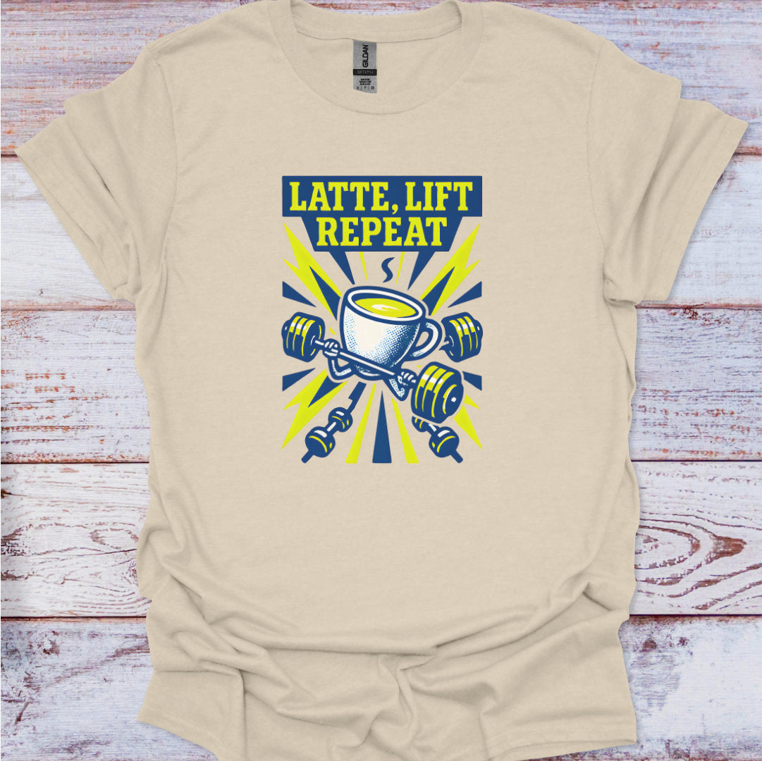 Beige t-shirt with 'Latte, Lift Repeat' graphic design on a wooden surface