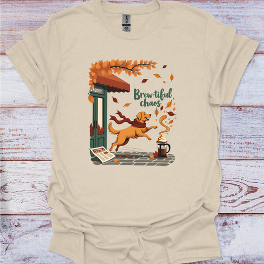 Beige t-shirt with a dog and coffee-themed graphic on a wooden surface