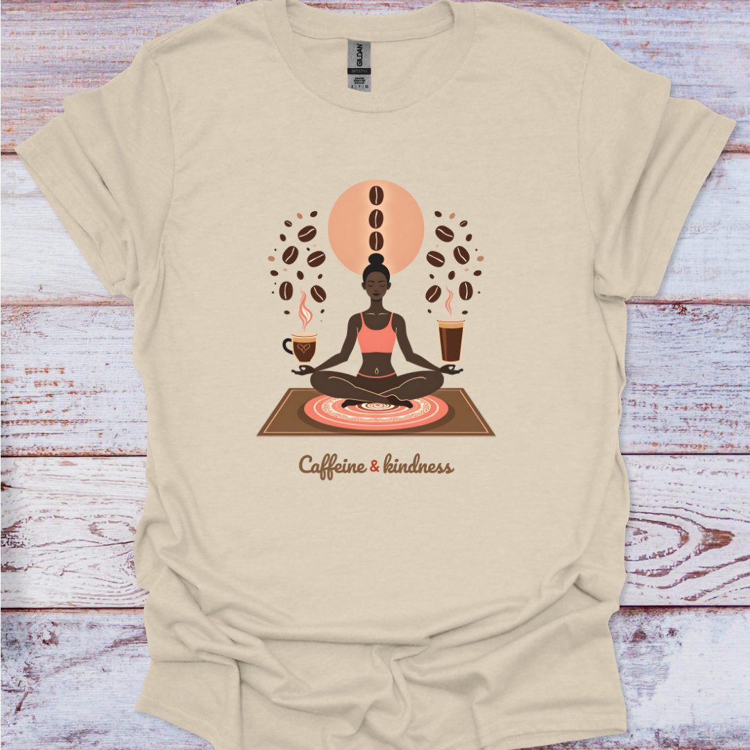 Beige t-shirt with a graphic of a person meditating surrounded by coffee beans and cups on a wooden surface.