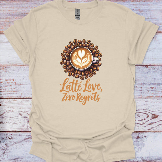 Beige t-shirt with a coffee-themed graphic and text on a wooden surface