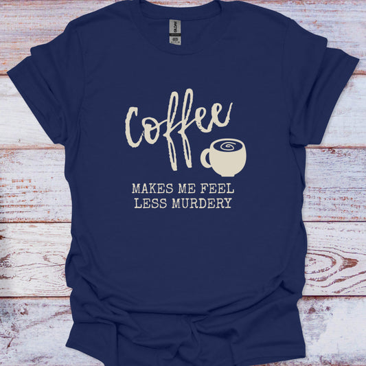 Navy blue t-shirt with white text and coffee graphic on a wooden surface