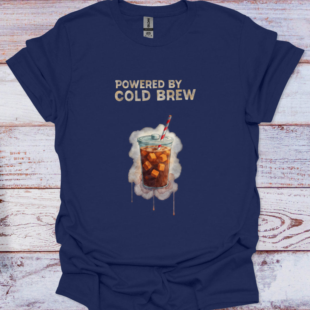 Navy blue t-shirt with 'Powered by Cold Brew' graphic on a wooden surface