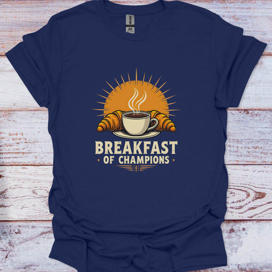 Navy blue t-shirt with 'Breakfast of Champions' graphic on a wooden surface