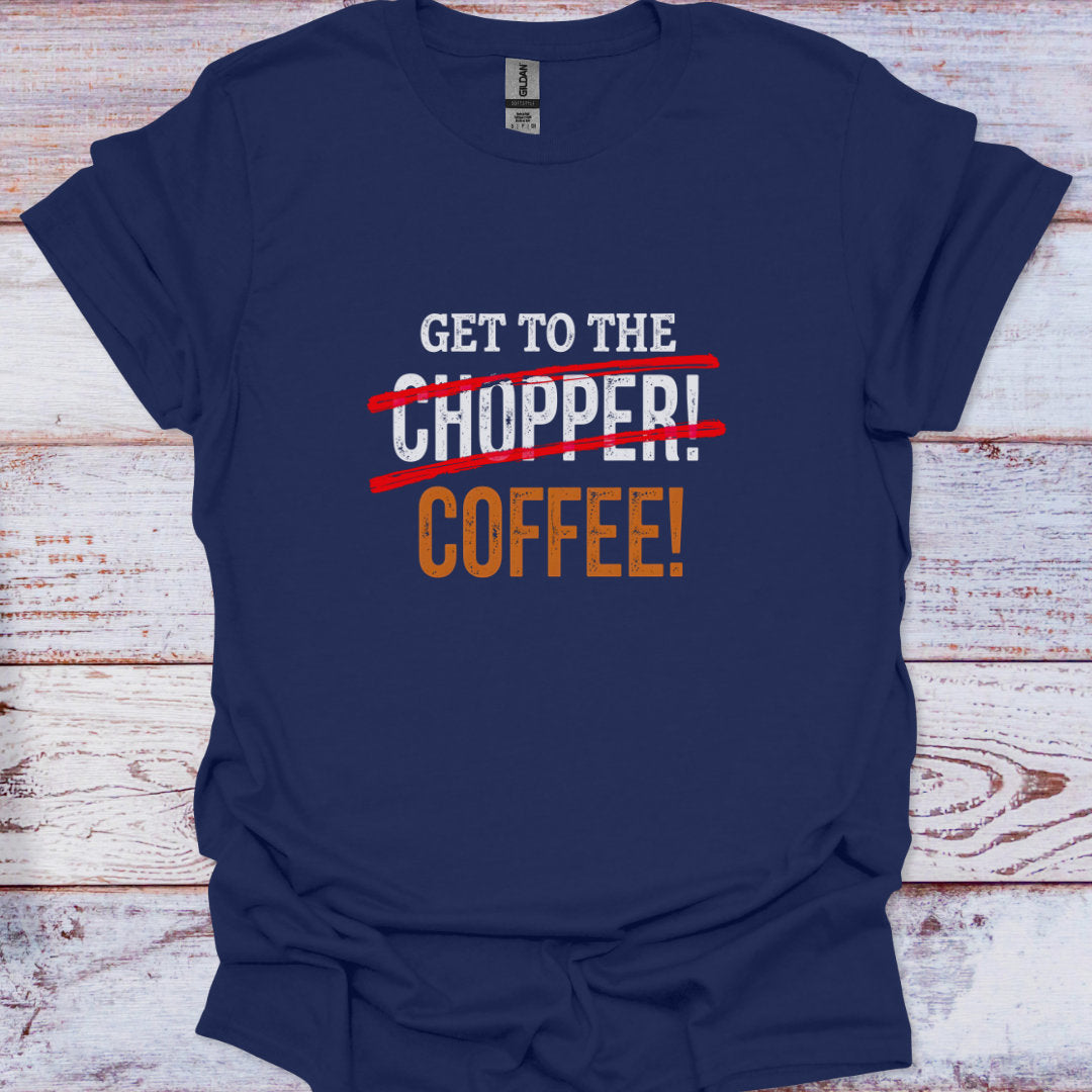 Navy blue t-shirt with text 'Get to the Chopper! Coffee!' on a wooden surface