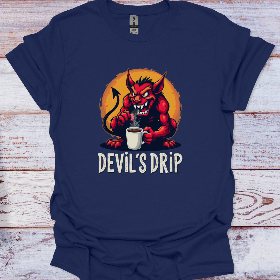 Navy blue t-shirt with a devil holding a coffee cup and 'DEVIL'S DRIP' text on a wooden surface.