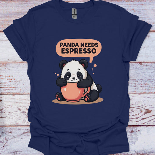 Navy blue t-shirt with a panda holding an espresso cup and speech bubble saying 'Panda Needs Espresso' on a wooden surface.