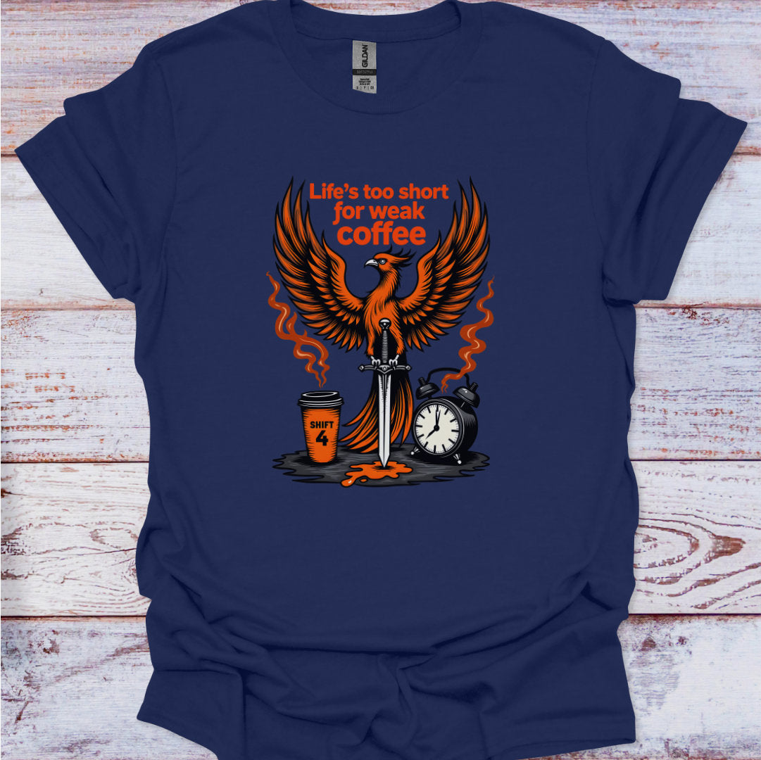 Navy blue t-shirt with a graphic design featuring an phoenix, coffee cup, sword, and alarm clock on a wooden surface.