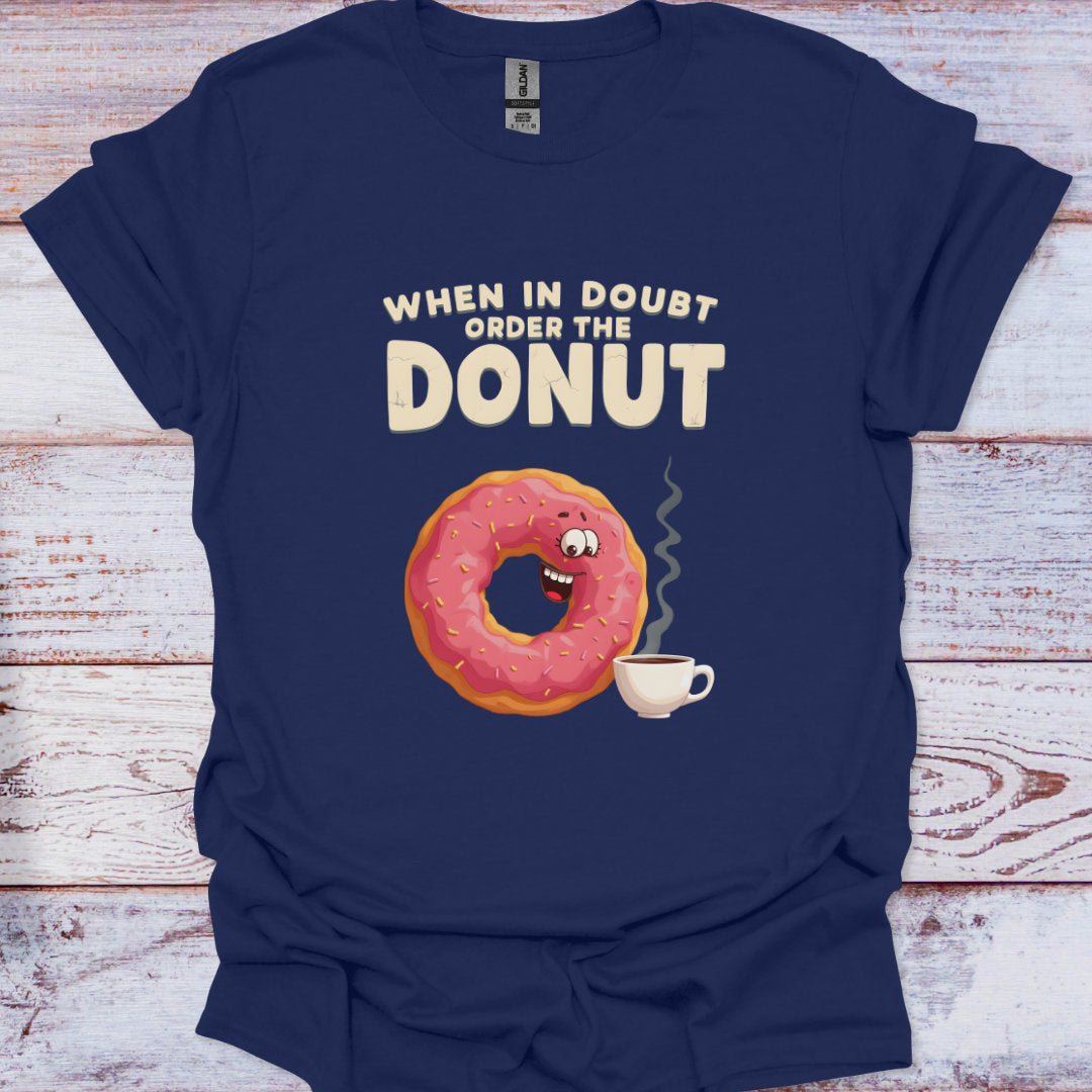 Navy blue t-shirt with a donut and coffee graphic and text on a wooden surface