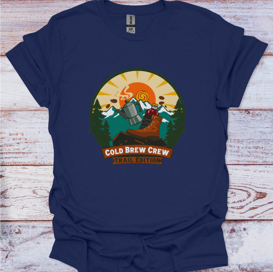 Navy blue t-shirt with 'Cold Brew Crew' graphic on a wooden surface