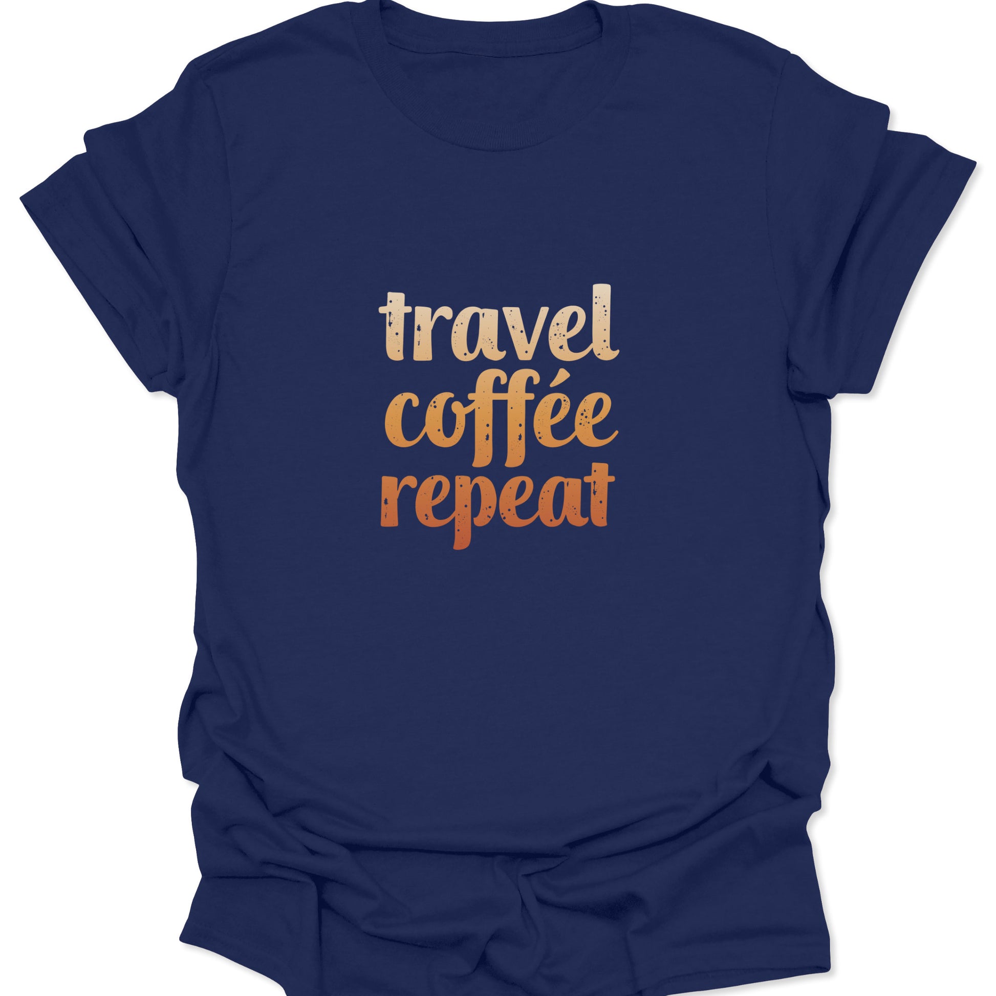A navy blue t-shirt with the "travel coffee repeat" graphic, where the orange and beige text creates a high-contrast pop against the cool blue background.