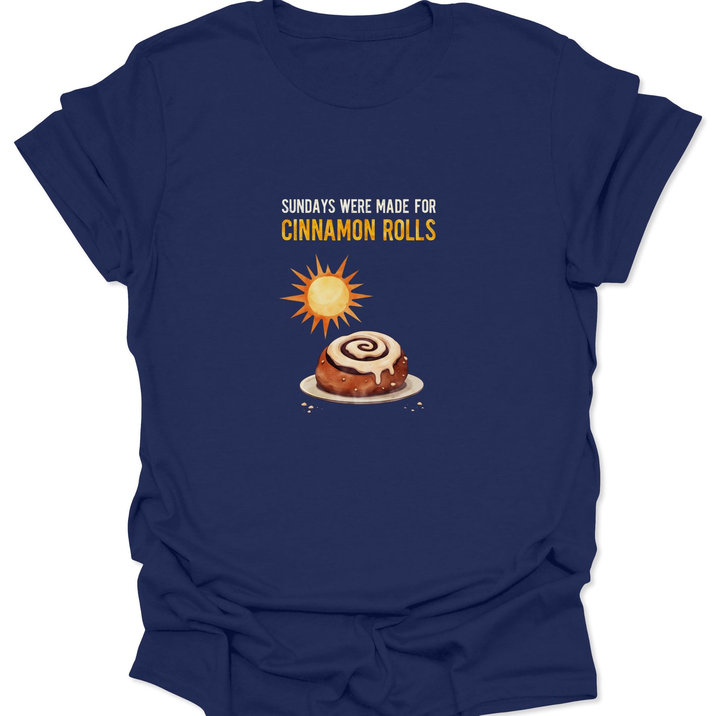 Navy blue graphic tee featuring a warm-toned cinnamon roll design and sunny breakfast vibes.