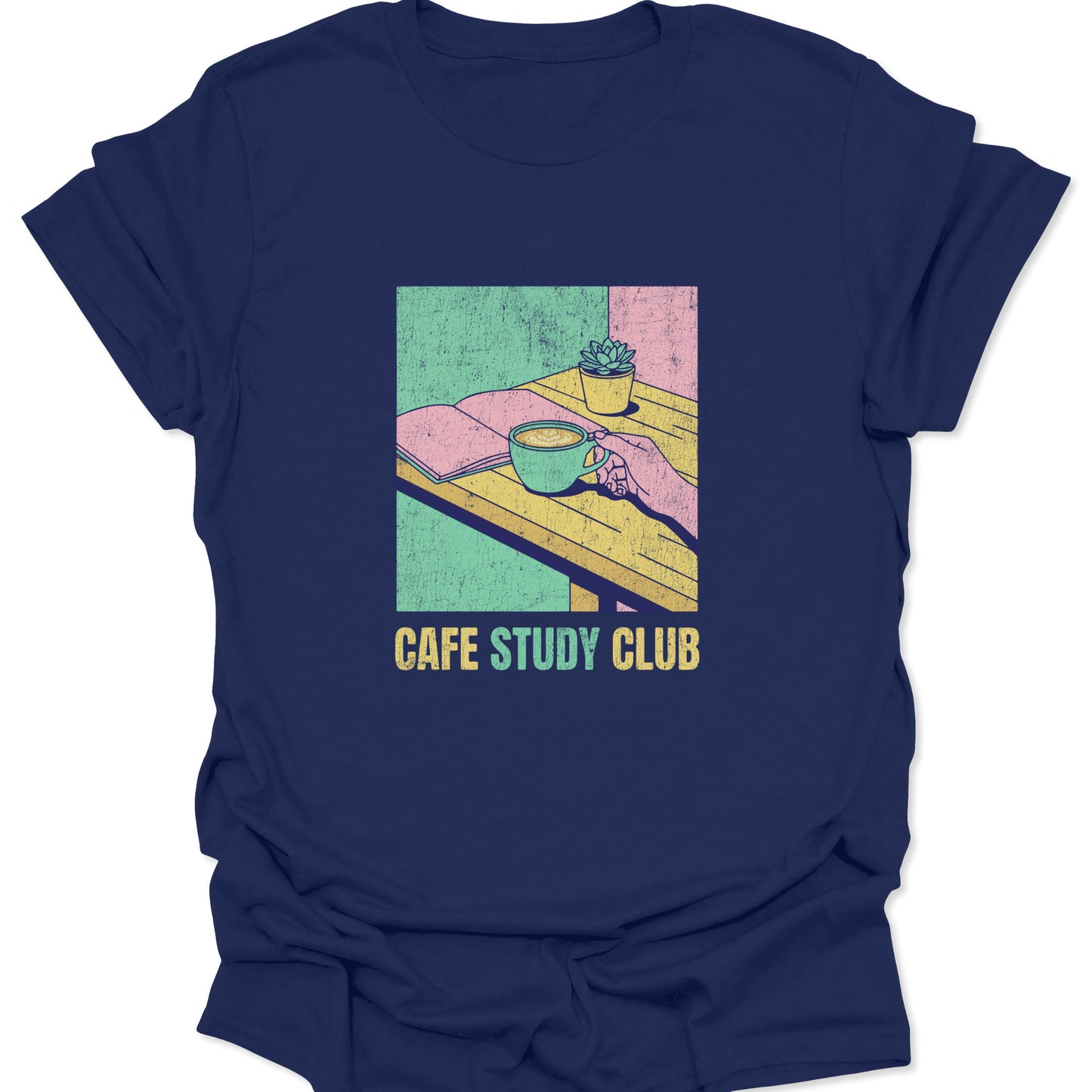 Vintage-inspired "Cafe Study Club" graphic on a navy blue t-shirt featuring a grainy, colorful illustration of a hand reaching for a cappuccino.
