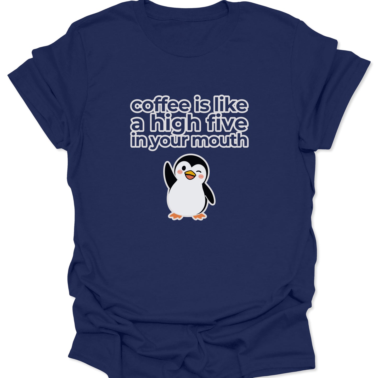 A navy blue t-shirt featuring a white and yellow cartoon penguin winking and waving below the text "coffee is like a high five in your mouth" in a bold, rounded font.