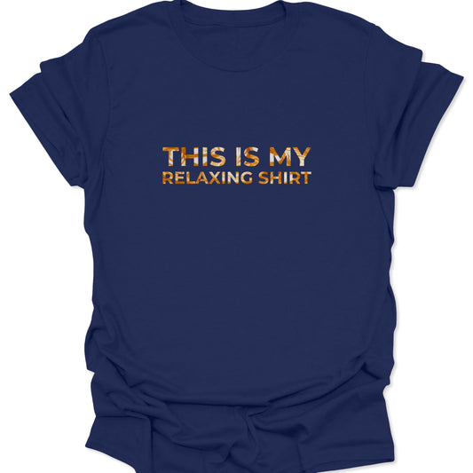 Navy blue graphic t-shirt with centered text "THIS IS MY RELAXING SHIRT" filled with a white and tan espresso foam pattern.