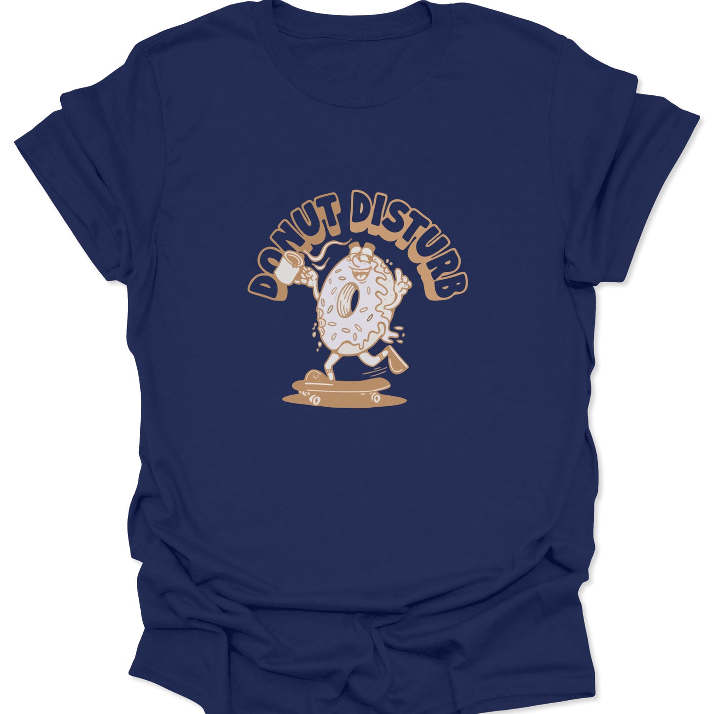 Graphic tee on dark navy fabric featuring a cartoon donut character skateboarding with a coffee mug and "Donut Disturb" text in tan.