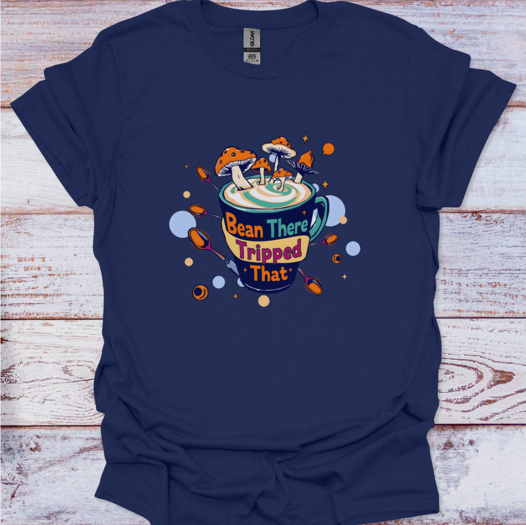 Navy blue t-shirt with a colorful graphic design on a wooden surface