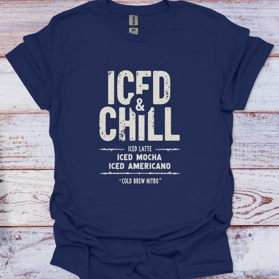 Navy blue t-shirt with 'ICED & CHILL' text on a wooden surface