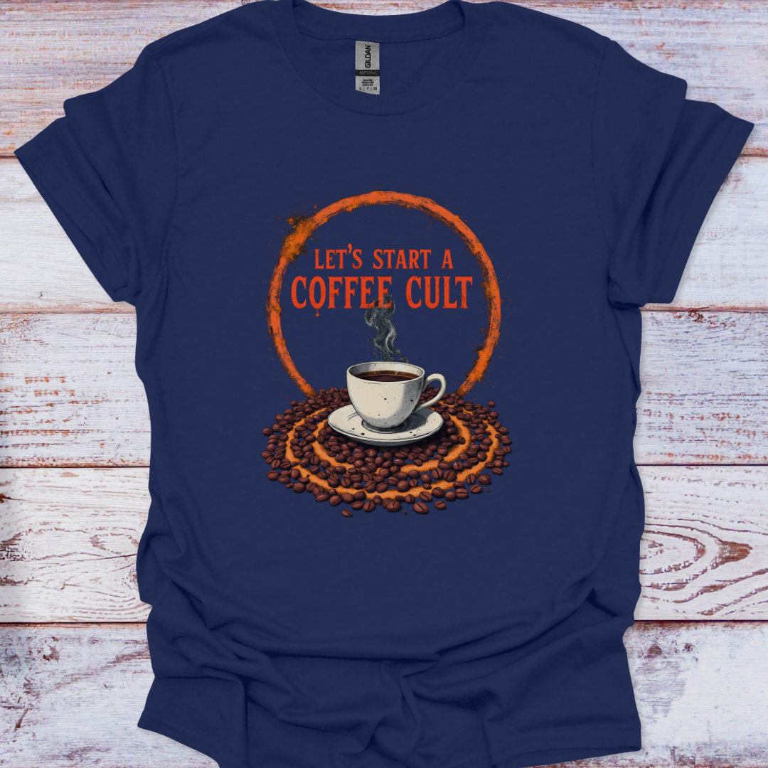 Navy blue t-shirt with coffee-themed graphic and text 'Let's Start a Coffee Cult' on a wooden surface.