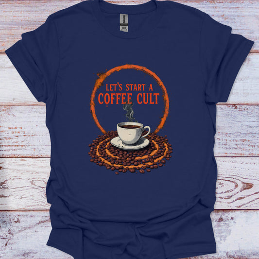 Navy blue t-shirt with coffee-themed graphic and text 'Let's Start a Coffee Cult' on a wooden surface.