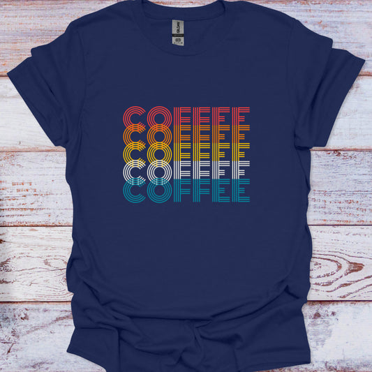 Navy t-shirt featuring stacked "COFFEE" text in retro linear red, orange, yellow, white, and teal stripes.