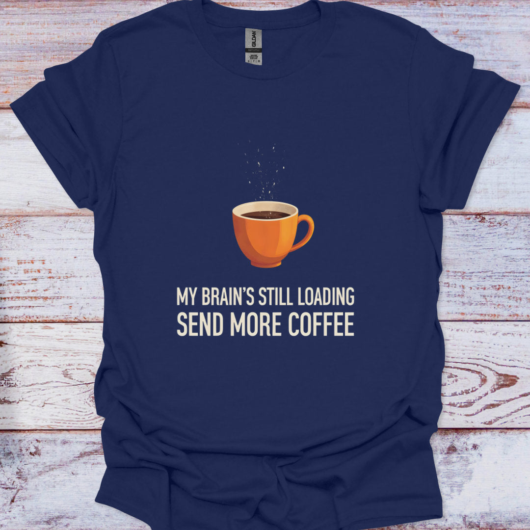 Navy blue t-shirt with a coffee cup graphic and text on a wooden surface