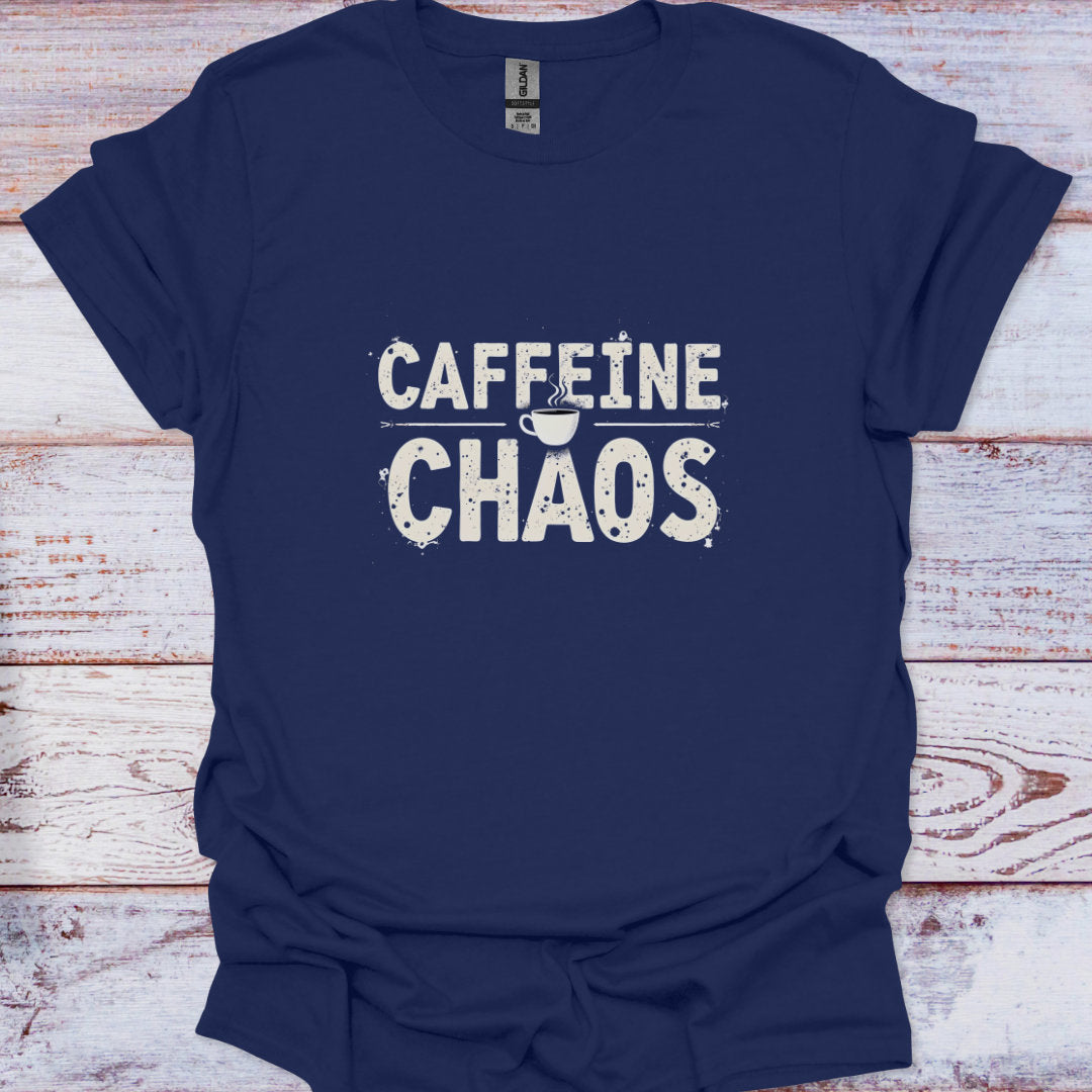 Navy blue t-shirt with 'CAFFEINE CHAOS' text on a wooden surface
