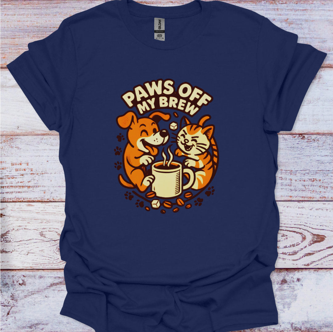 Navy blue t-shirt with a graphic of a dog and cat drinking coffee and 'Paws Off My Brew' text on a wooden surface.