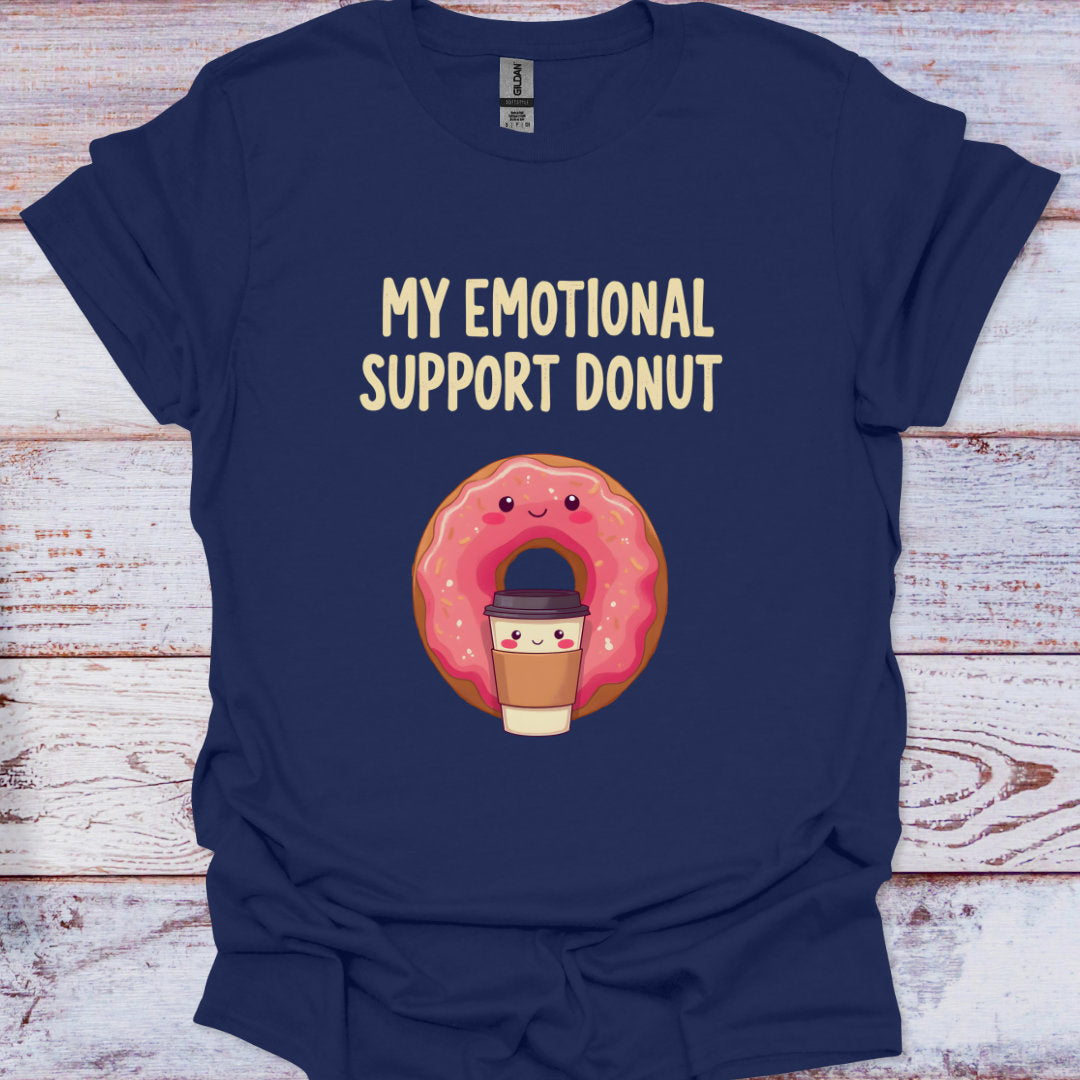 Navy blue t-shirt with a cartoon donut and coffee cup graphic and text 'My Emotional Support Donut' on a wooden surface.