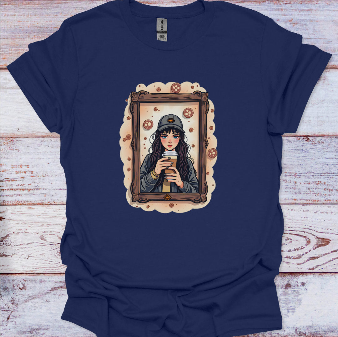 Navy blue t-shirt with a graphic of a woman holding a coffee cup in a wooden frame on a wooden surface.