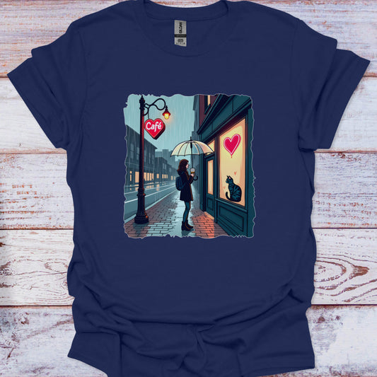 Navy blue t-shirt with a graphic of a woman at a cafe window on a wooden surface