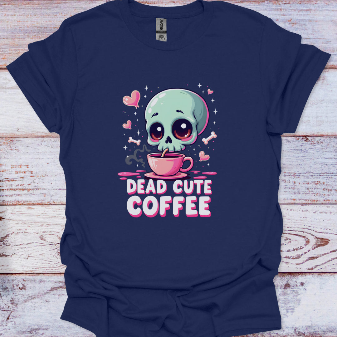 Navy blue t-shirt with a cartoon skull holding a coffee cup and text 'Dead Cute Coffee' on a wooden surface.